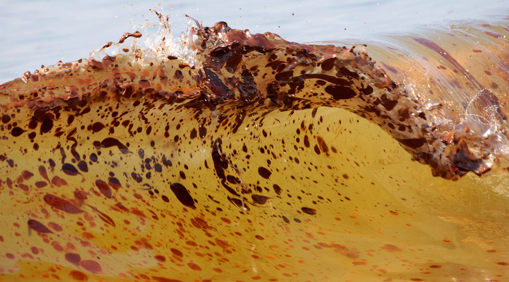 Crude oil from the Deepwater Horizon oil spill washes ashore in Orange Beach, Alabama; Saturday, June 12, 2010